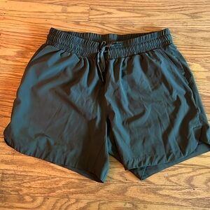 Size M woman's army green shorts.